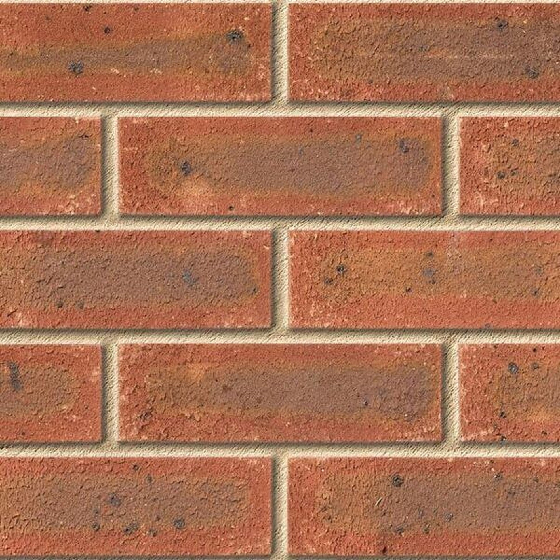 Ibstock Balmoral wirecut facing brick laid in stretcher bond, mottled red and orange stock texture