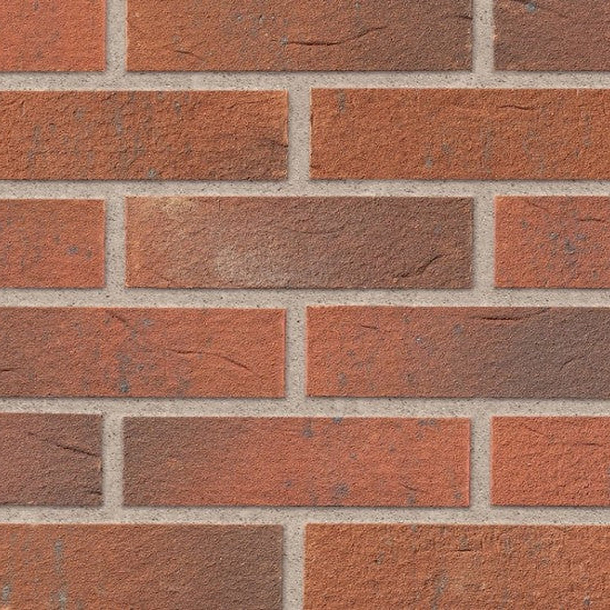 Ibstock Mixed Red facing brick laid in stretcher bond, varied red and brown multi tones